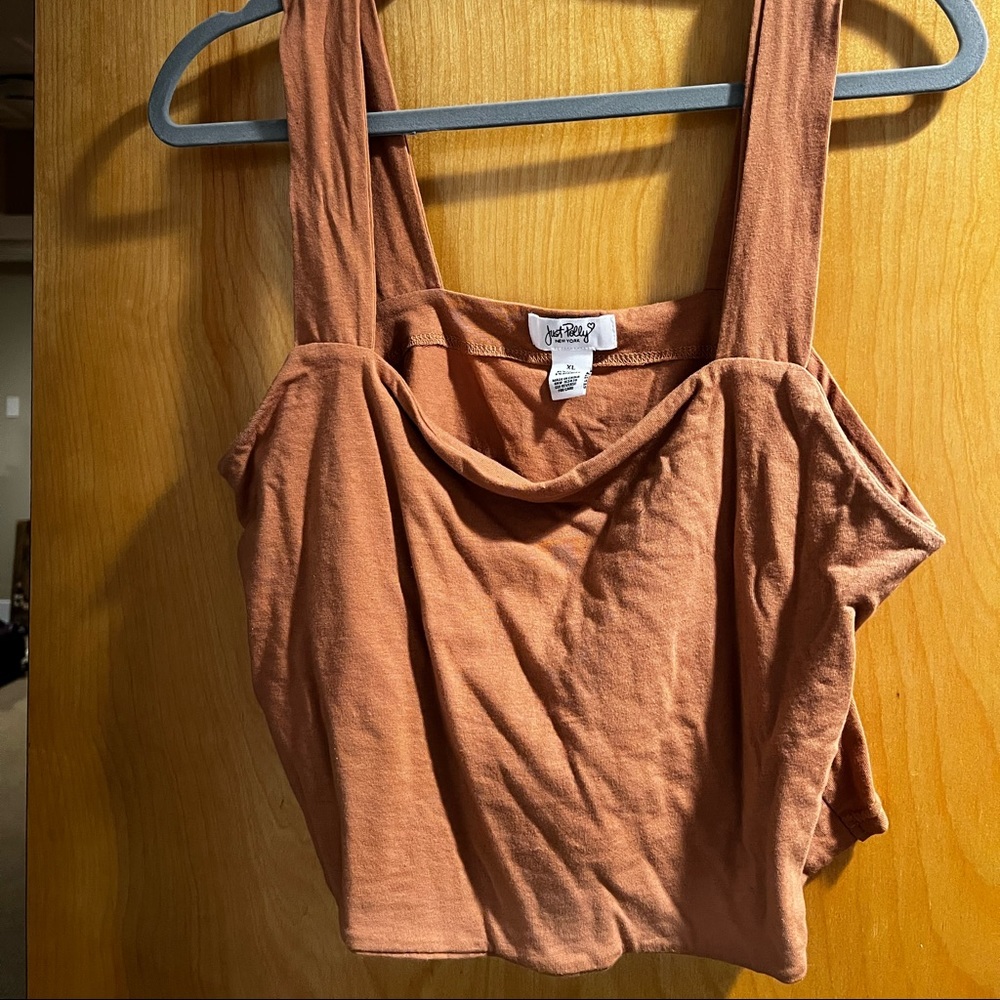 Never worn!! thick banded top to keep the girls up!!